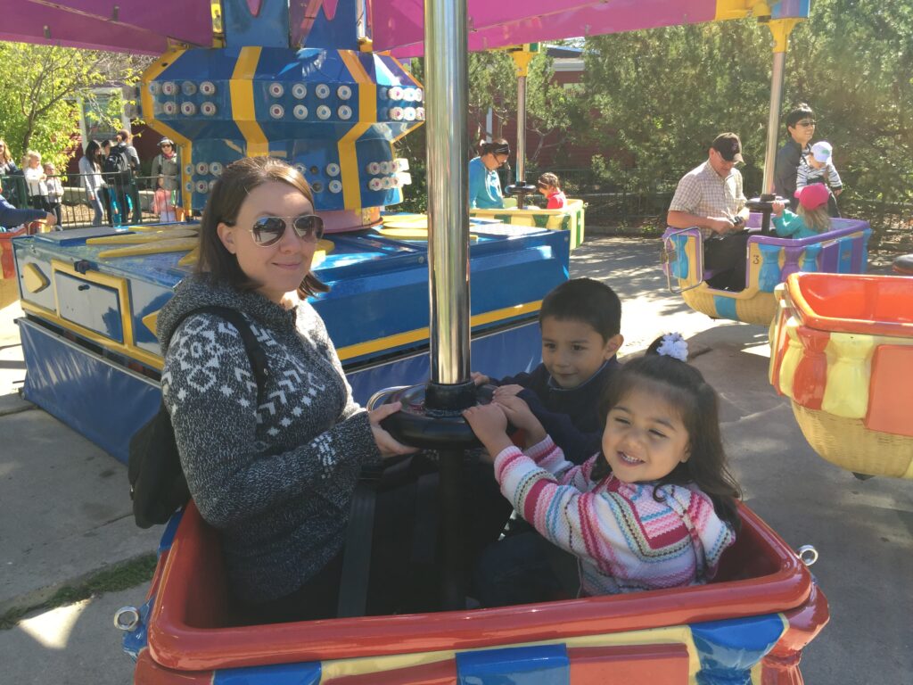 Family riding an amusement ride at Calaway Park in Calgary.