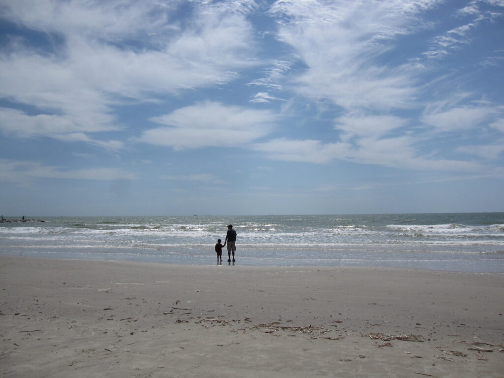 Beachgoers at Galveston Beach.