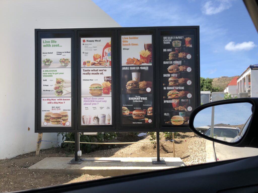 Drive-though menu at McDonald's for people in St. Maarten with kids or alone.