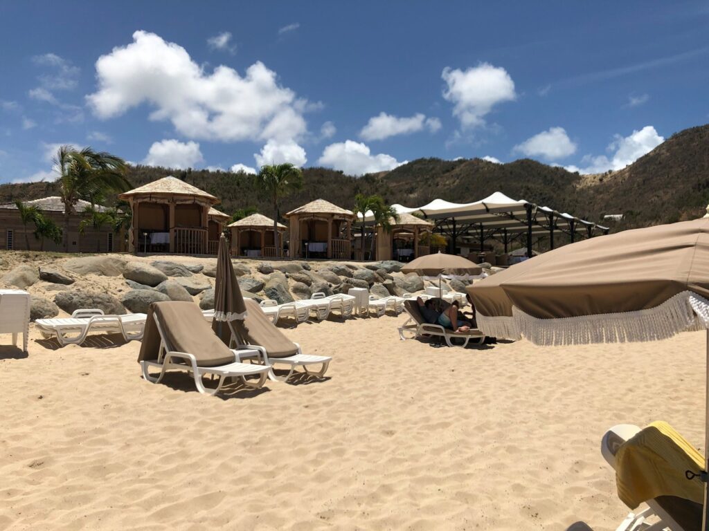 Beachfront restaurant with cabana style personal tables in St. Martin.