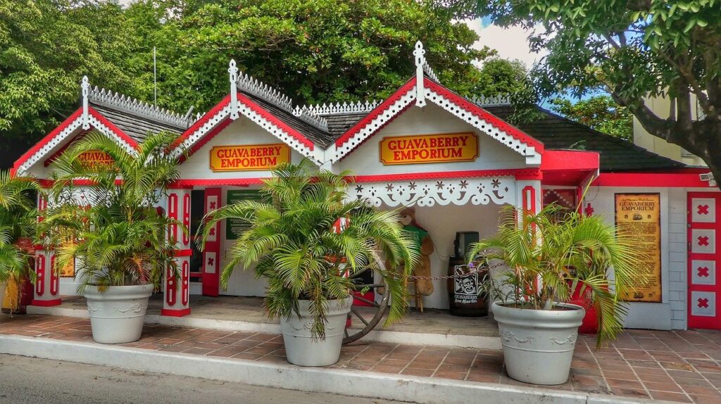 White and red storefront of Guavaberry Emporium in St. Maarten.