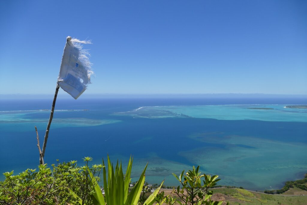 View from a mountain overlooking the ocean and reef.