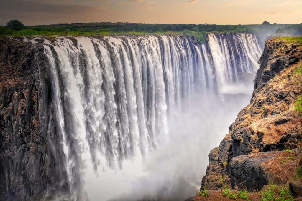 Victoria Falls waterfall cascading down in Zimbabwe.