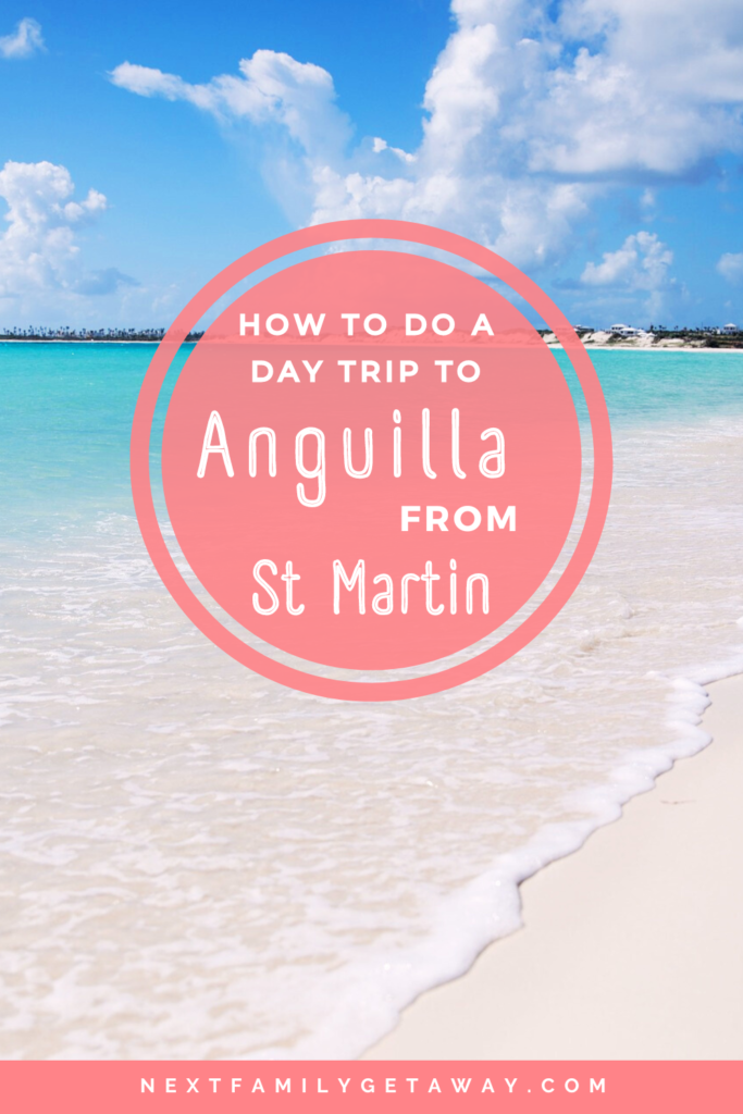 Seafoam washes upon a white sand beach with text overlay about day trip to Anguilla from St. Maarten