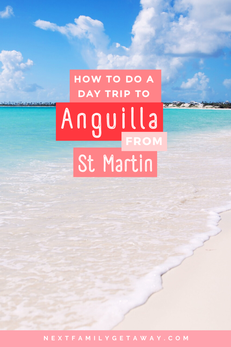 Seafoam washes upon a white sand beach with text overlay about day trip to Anguilla from St. Maarten