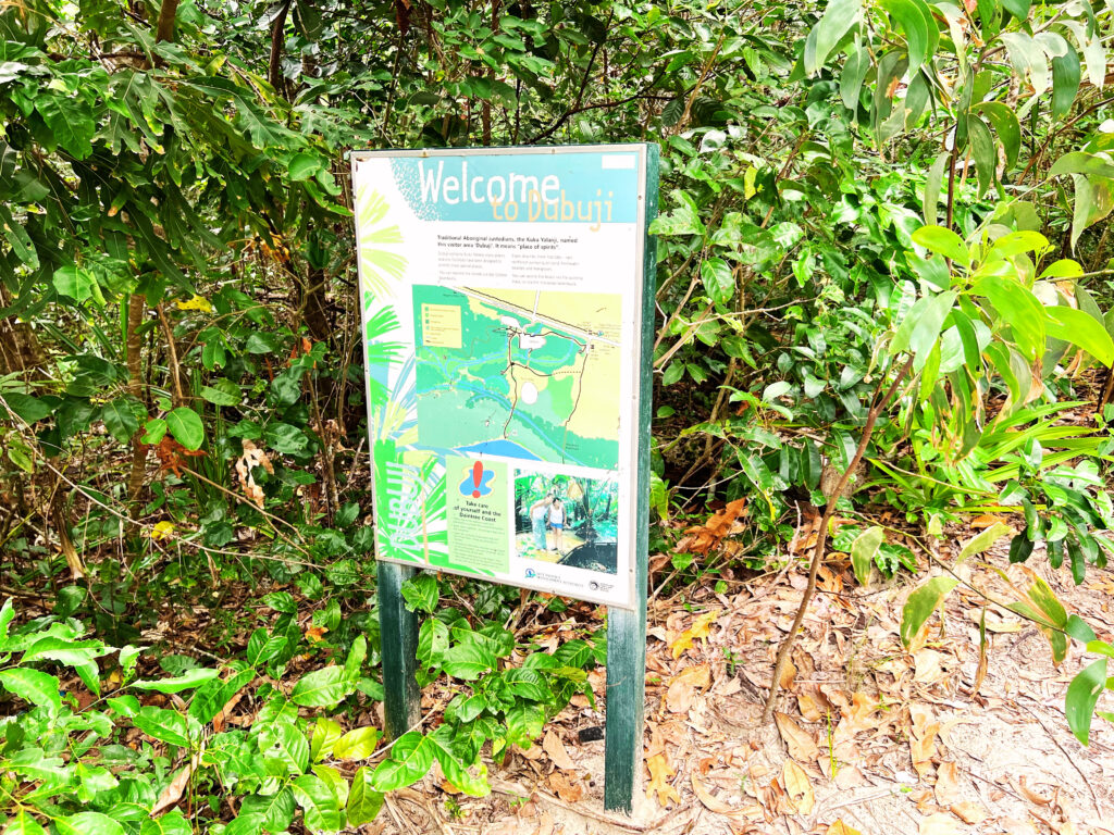 Sign saying Welcome to Dubuji, posted on the rainforest path.