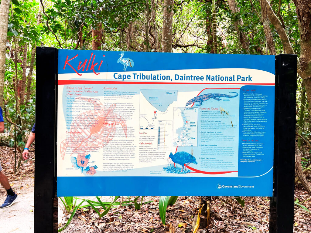 Large informational sign posted at entrance of Cape Tribulation Beach.