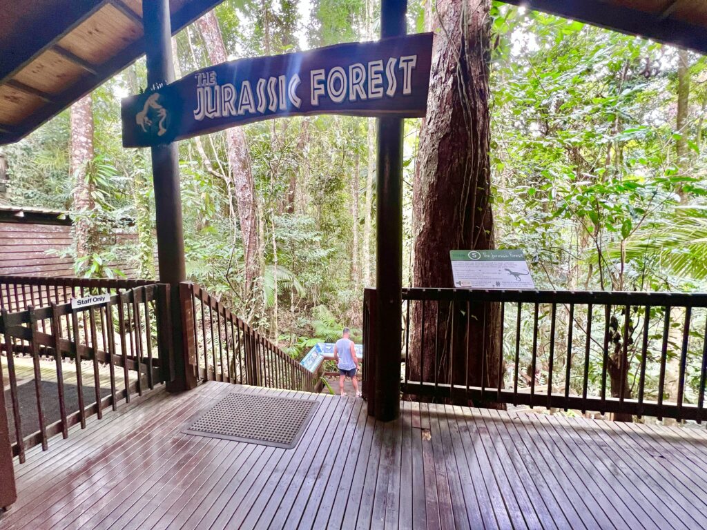 Wooden sign for the Jurassic Forest at the entrance to the trail.