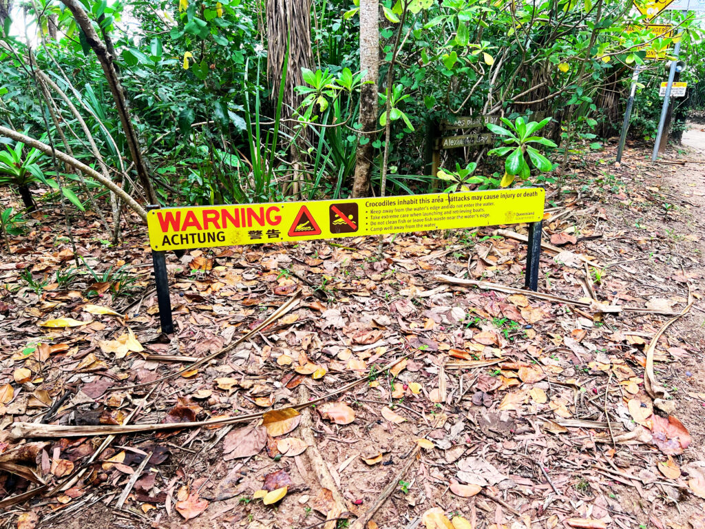 Warning sign at entrance to Cow Bay Beach.