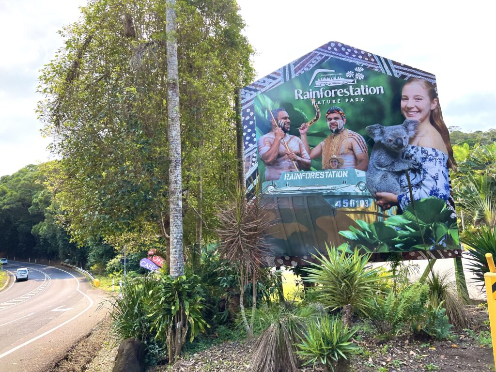 Roadside billboard sign for Rainforestation Nature Park, somewhere you should visit on 5 days in Tropical North Queensland.