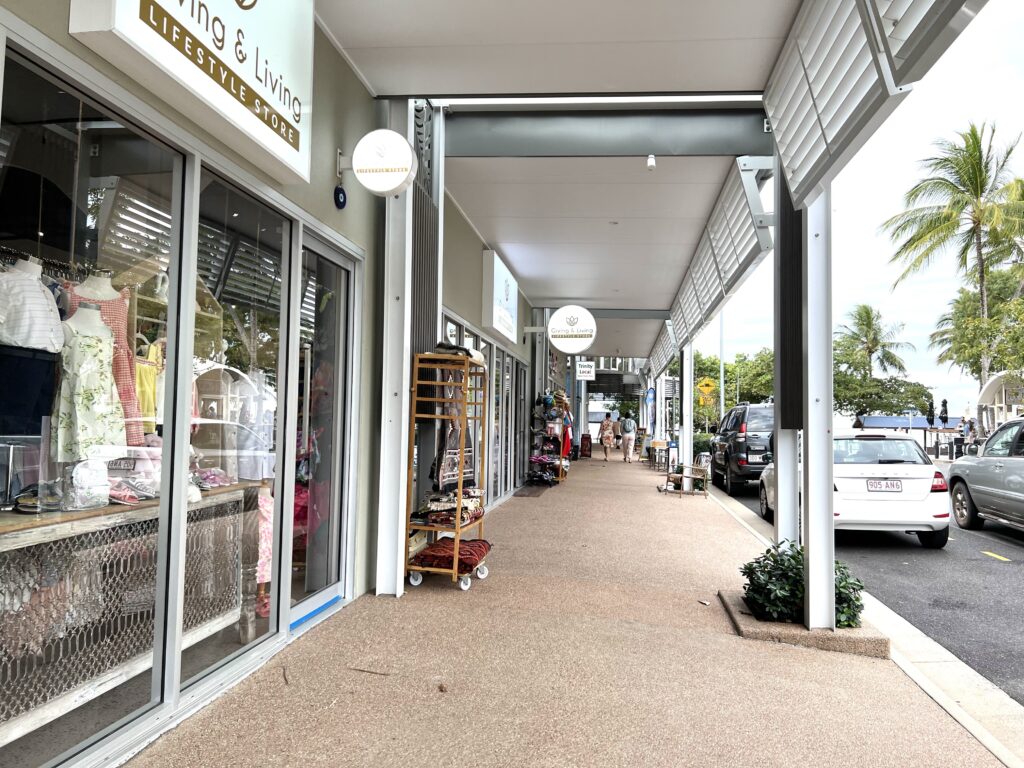 Storefronts along a street.