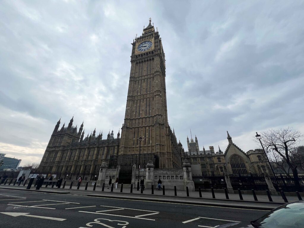 Street view looking at the old Elizabeth Tower and clock named Big Ben.
