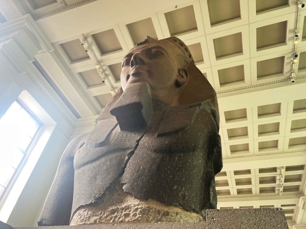 A large Egyptian sculpture on display in the British Museum.