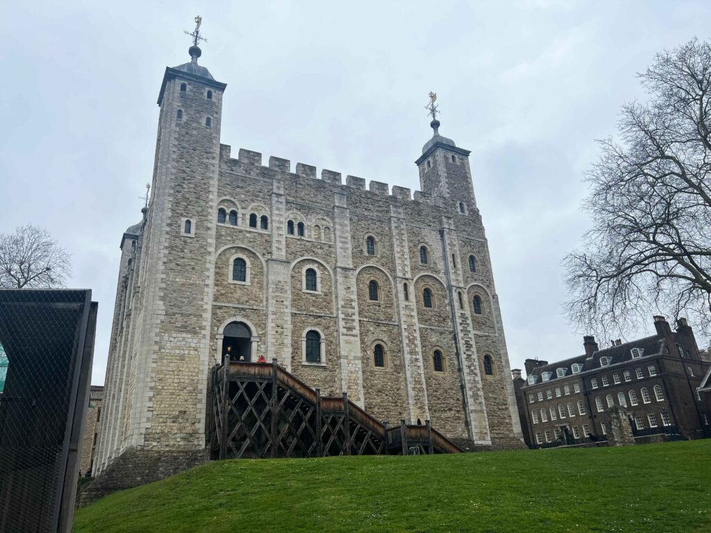 Large stone castle with two towers at the Tower of London, must see when in London with teens.