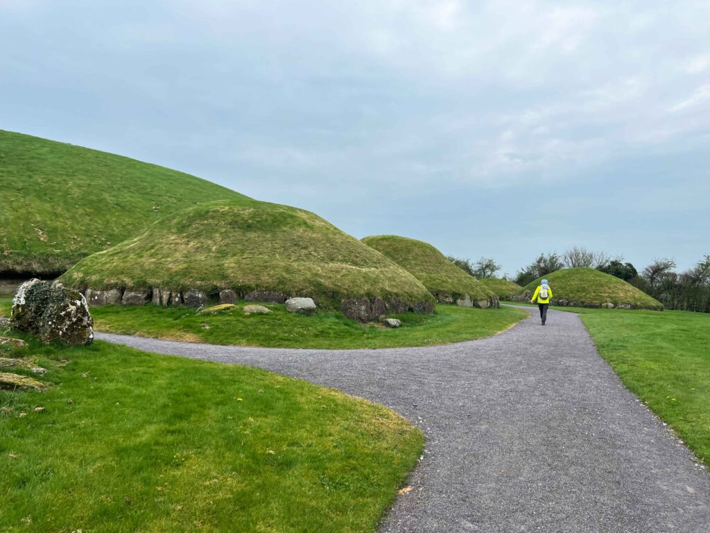 Grass covered mounds that are satellite tombs.