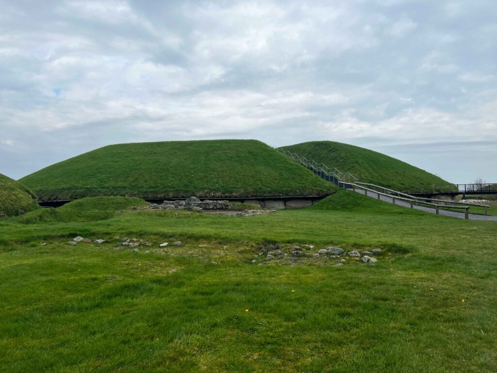 Large green mound with staircase going un the center.