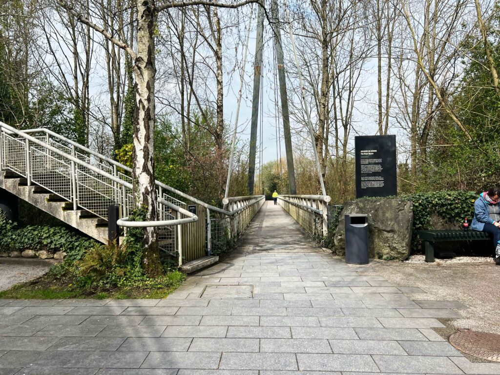 Stone pathway leading to bridge in the country.