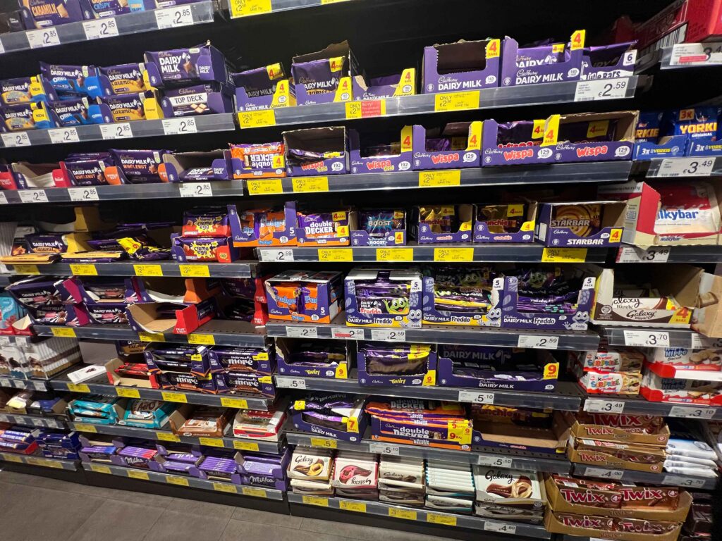Shelves of chocolate bars you can find on a stopover in Ireland.
