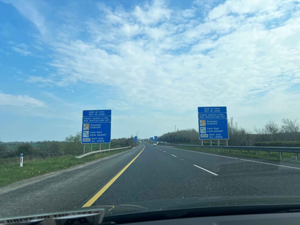 Highway with toll signs.