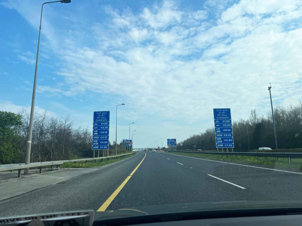 Highway with toll signs.