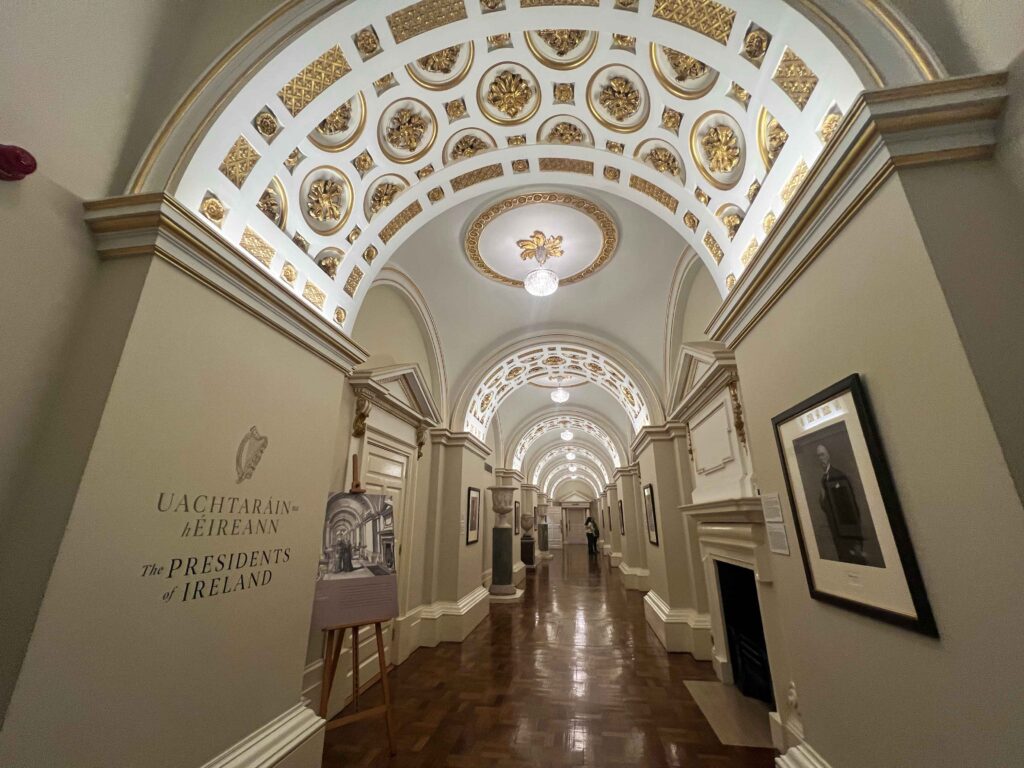 Long hallway with elegantly decorated archways.