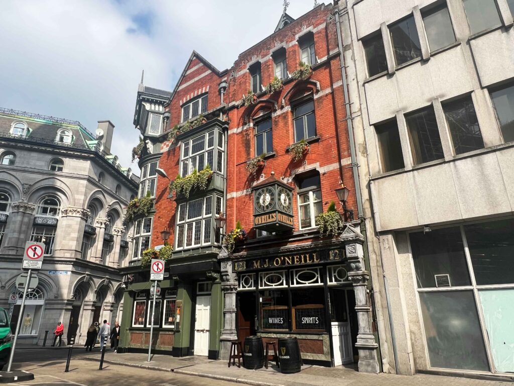 Picturesque red brick building on a street in Dublin.