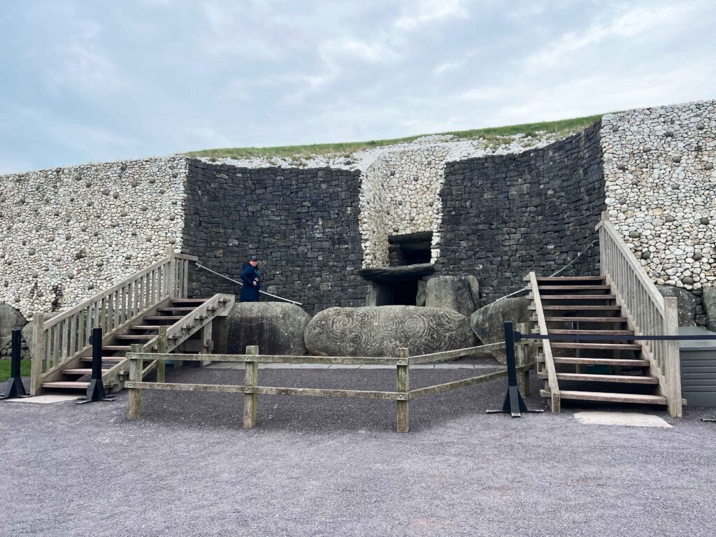 Stone wall with staircases on either side of entrance, a must see on a stopover in Ireland.