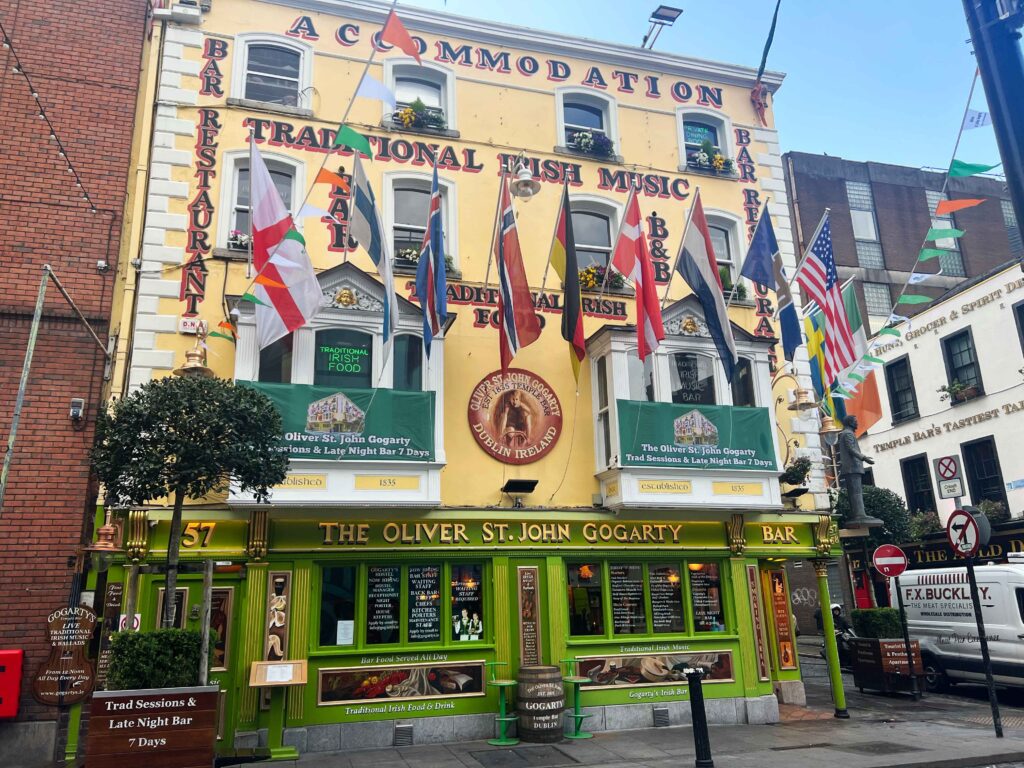 Colorful building with many country flags attached in Dublin.